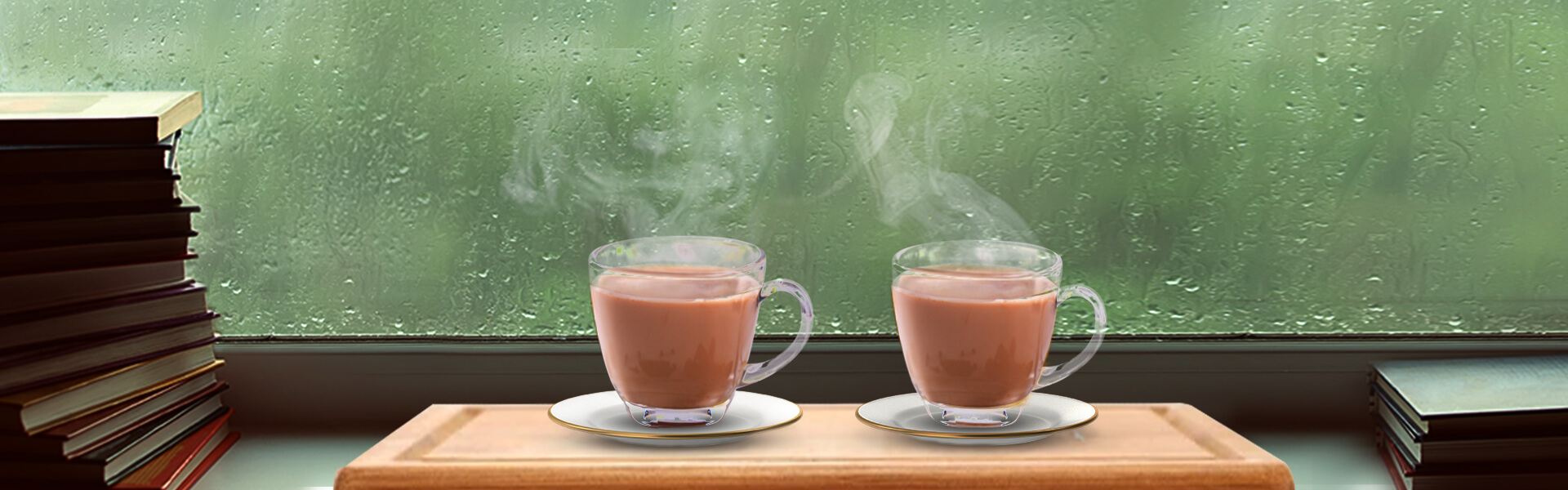 Two Tea Cups filled with tea kept on study table with monsoon window view